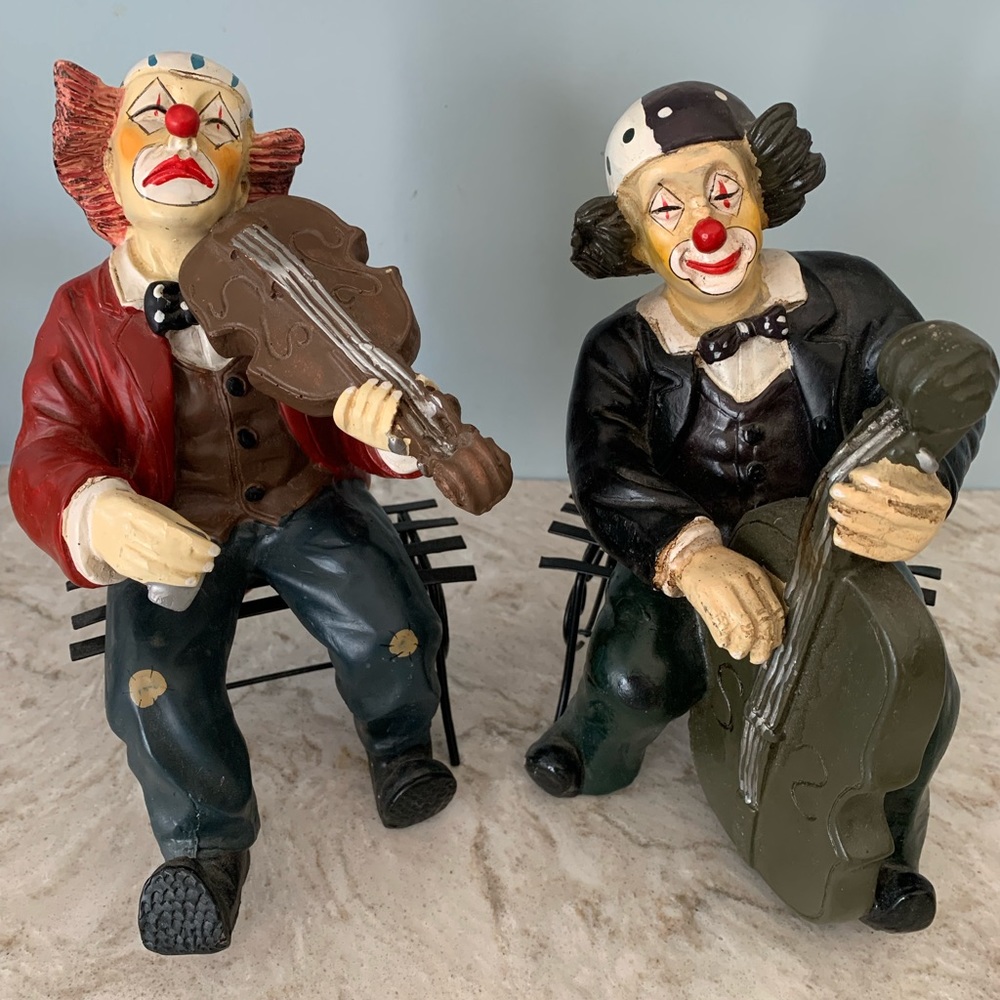 Clowns Playing Instruments on Benches
